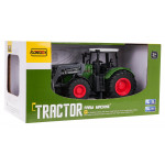 Zelený traktor s buldozérom